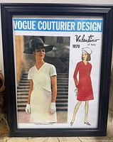 Front view of framed poster showing entire Vogue Couturier Design Valentino 1970 print