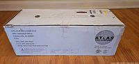 Sealed shipping box labeled Atlas Fan Company