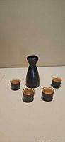 Front view of entire 5-piece sake set
