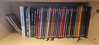 Shelf view showing full row of Time Life Good Cook hardcovers plus Ricardo and other books