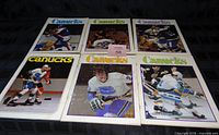 All six Vancouver Canucks 1970s game programs laid out in two rows