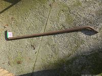 Full view of crowbar on concrete surface