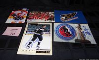 All five autographed hockey postcards displayed