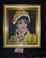 Front view of framed portrait showing subject, frame, signature