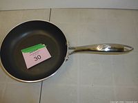 Top view of frying pan showing non-stick interior and handle