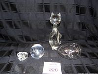 Group shot of all four clear glass pieces