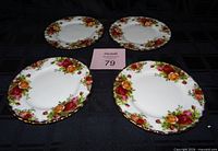 Four Royal Albert Old Country Roses plates displayed top view