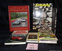 Front covers of all six automotive and racing books