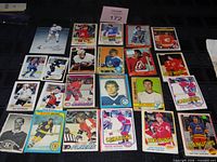 All 24 cards laid out on black surface