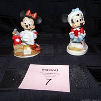 Front view of Mickey and Minnie Mouse ceramic figurines