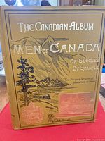 Front cover of one volume showing gilt title and illustration