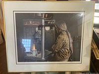 Framed print showing full artwork with frame and mat