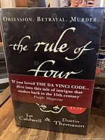 Front view of dust-jacketed book with promotional band