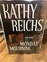 Front cover with dust jacket showing title and author