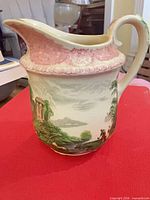 Left side of Royal Doulton Chatham pitcher showing classical ruins scene