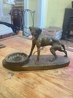 Full view of dog lamp base, oval platform, missing socket