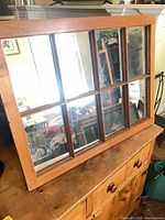 Front angled view of pine frame mirror showing eight panes