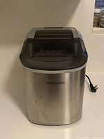 Front view of Frigidaire stainless steel countertop ice maker