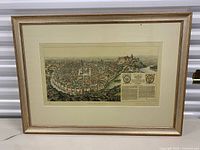Full view of framed hand-colored Kraków map print
