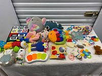 Overall view of all baby toys on table