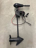 Full view of Shakespeare Glider 32 trolling motor showing shaft, mount, propeller, and power cables