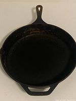 Top view of the skillet showing cooking surface and both handles