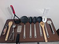 All twelve utensils laid out on table