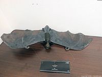 Front view of Ashland hanging bat decoration on table