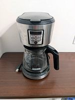Front view of BLACK+DECKER drip coffee maker with glass carafe