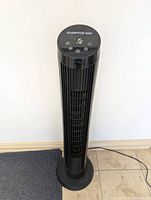 Front view showing LED display and grille