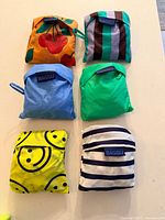 All six folded Baggu bags displayed together