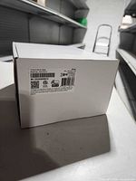 Factory barcode label on side of sealed ADT base box