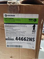 Close-up of HALYARD label showing model 44662NS, size L, quantity 40