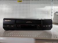 Front view of Quasar VHQ-400 VCR showing brand and 4-head marking