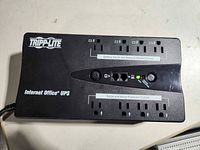 Top view showing eight outlets, control panel and Tripp Lite branding