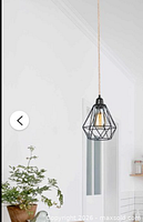 Promotional image showing hemp rope pendant light with black geometric cage shade suspended from ceiling