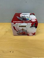Retail box front showing LVXIN 2.5 L enamel kettle