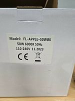 Box label showing model, wattage, color temperature, voltage, date code and CE mark