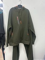 Olive green hoodie and jogger pants displayed together