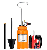Kit components including orange canister, gauge, hoses, cone, clamps