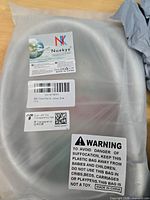 sealed package showing Noekye brand and hose