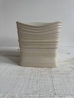 Front view showing ribbed ceramic tissue box cover