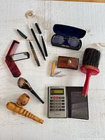 Group shot of entire lot displayed on white surface