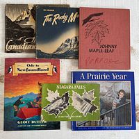 All six books front covers visible