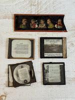 Five glass slides laid out to show types and condition