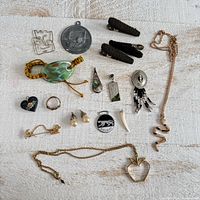 All seventeen jewellery pieces laid out together