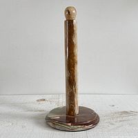 Full view of stone paper towel holder front