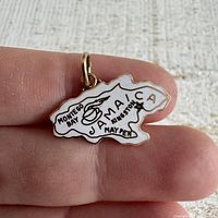 Front view showing enamel design and lettering