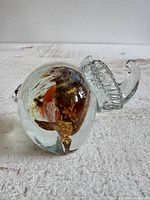 Side view showing elephant form, internal color pattern