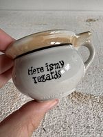 Front view showing text "Here is my regards"